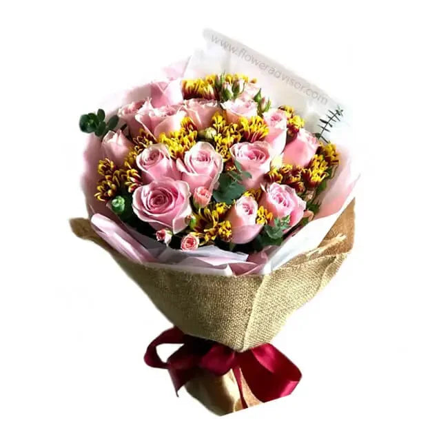 Hand bouquet of 15 soft pink roses and yellow flowers, perfect for flower delivery
