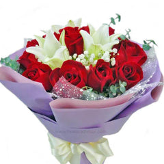 Hand bouquet with red roses and white lilies, ideal for flower delivery in Singapore