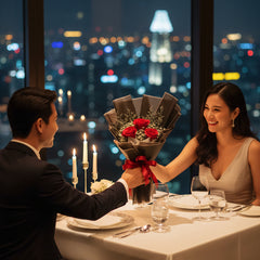 Red rose bouquet with baby's breath in black wrapping for flower delivery in Singapore