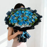 Elegant bouquet of blue roses with baby's breath for flower delivery in Singapore