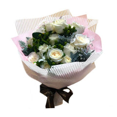 White rose bouquet with green hypericum berries, perfect for flower delivery in Singapore