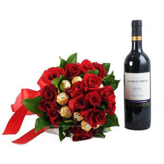Red rose bouquet with Ferrero Rocher and wine, perfect for flower delivery gifts