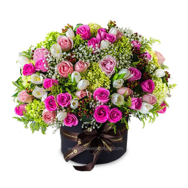 Box of mixed roses and fillers, vibrant bouquet for flower delivery in Singapore