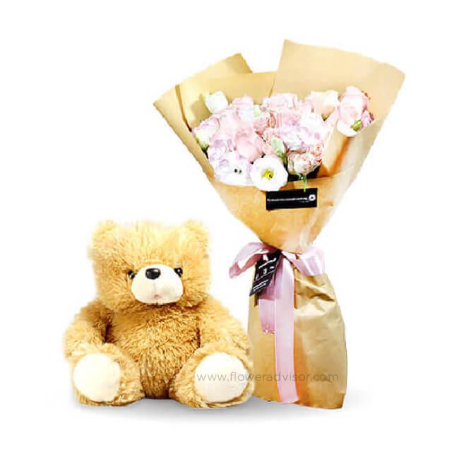 Flower delivery of 12 pink roses bouquet with soft teddy bear gift