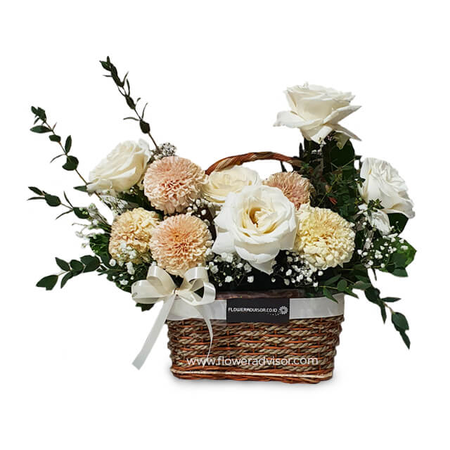 Fresh flower delivery basket with white roses and peach carnations arrangement