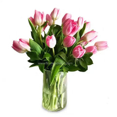 Pink tulip bouquet in a clear vase for flower delivery in Singapore
