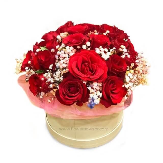 Red roses bouquet with fillers in round box, perfect for flower delivery in Singapore