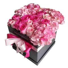 Pink and light pink flower arrangement in a gift box, ideal for Singapore flower delivery