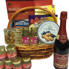 Gift hamper with tea, cookies, bird’s nest jars and sparkling juice for flower delivery