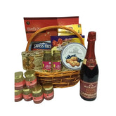 Gift hamper with tea, biscuits, tonic jars, and sparkling drink for flower delivery gift