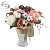 Elegant mixed flower bouquet in glass vase for flower delivery in Singapore