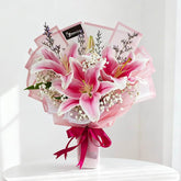 Pink lily bouquet with baby's breath, ideal for fresh flower delivery in Singapore