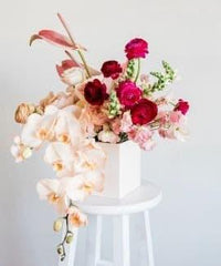 Elegant mixed flower bouquet in white box, ideal for flower delivery in Singapore