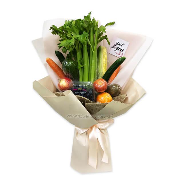 Fresh fruit and vegetable bouquet with carrots, celery, apples and a gift card for delivery