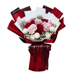 Elegant flower bouquet with red and pink roses, perfect for flower delivery Singapore