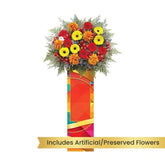 Standing flower arrangement with red, yellow, and orange blooms for flower delivery