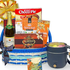 Festive gift hamper with chocolates, snacks, and flowers for celebratory delivery in Singapore
