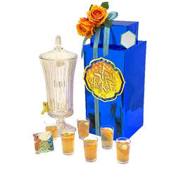Festive flower arrangement with bright roses and gift box, ideal for Hari Raya flower delivery