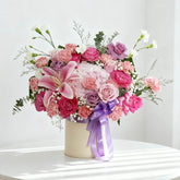Fresh flower bouquet with pink lilies, roses, and carnations for flower delivery in Singapore