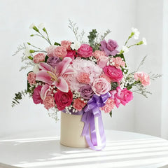Fresh flower bouquet with pink lilies, roses, and carnations for flower delivery in Singapore