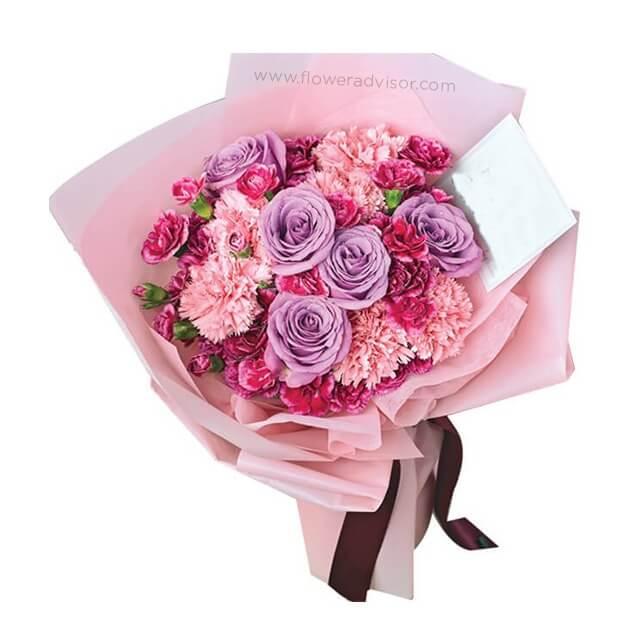 Pink and purple bouquet with roses and carnations for online flower delivery