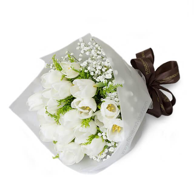 Elegant white tulip bouquet with baby's breath, perfect for flower delivery in Singapore
