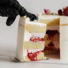 Fresh cream cake with strawberry layers, perfect for flower delivery celebrations