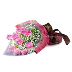 Pink tulip bouquet with baby's breath for flower delivery, wrapped in pink mesh and ribbon
