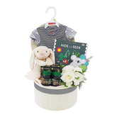 Newborn gift hamper with white rose bouquet, plush bunny, baby clothes, and storybook for flower delivery