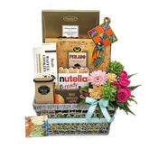 Festive Hari Raya gift basket with fresh flowers and assorted treats for flower delivery