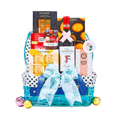 Festive flower delivery gift hamper with wine, biscuits, chocolates and decorative bow