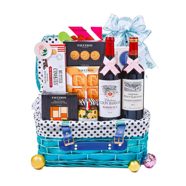 Gift hamper with wine, cookies, and treats, ideal for flower delivery and gifting occasions