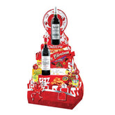 Festive floral gift hamper with wine, snacks, and treats for flower delivery in Singapore