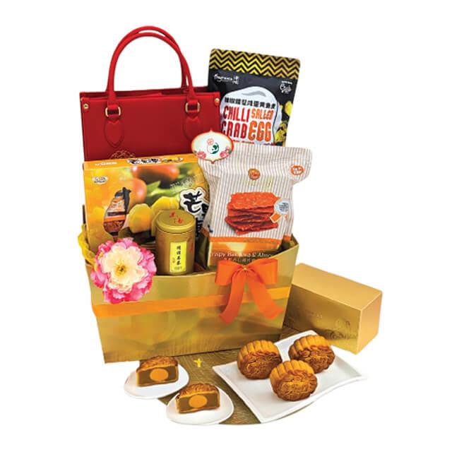Flower delivery gift hamper with fresh flowers, snacks, and mooncakes in a festive box