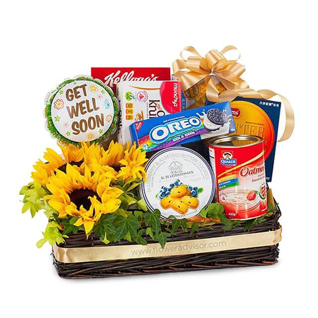 Get well soon flower delivery gift basket with sunflowers, snacks, and assorted treats