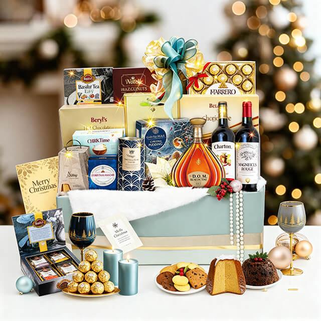 Festive flower delivery gift hamper with wine, chocolates, cookies, and holiday treats