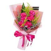 Bright pink carnation bouquet with greenery, perfect for same-day flower delivery in Singapore