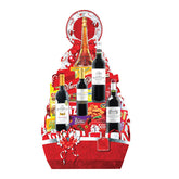 Festive gift hamper with wine, snacks, and red ribbon for flower delivery gift