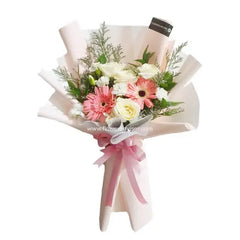 Hand-tied bouquet with pink gerberas and white roses for flower delivery in Singapore