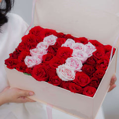 Flower box with red and pink roses arranged for flower delivery in Singapore