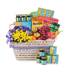 Flower delivery basket with fresh yellow and purple flowers, fruits, and wellness gifts