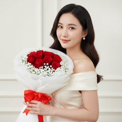 Fresh red rose bouquet with white baby’s breath, perfect for flower delivery Singapore