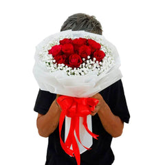 Red rose bouquet with white baby's breath and red ribbon, flower delivery gift