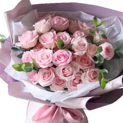 Elegant pink rose bouquet with greenery, perfect for flower delivery in Singapore