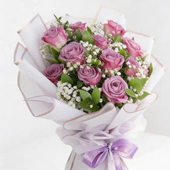 Purple rose bouquet with baby’s breath, perfect for flower delivery in Singapore