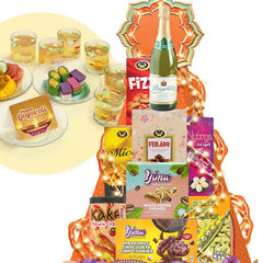 Colorful gift hamper with assorted snacks, cookies, and festive treats for flower delivery