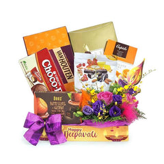 Deepavali gift hamper with fresh flowers, assorted chocolates and sweets for flower delivery