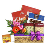 Deepavali flower delivery hamper with cookies, chocolates, fresh flowers and festive card
