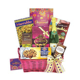 Deepavali gift hamper with snacks, chocolates, and sparkling drink for flower delivery