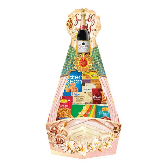 Flower delivery gift basket with assorted snacks, wine, and floral decorations